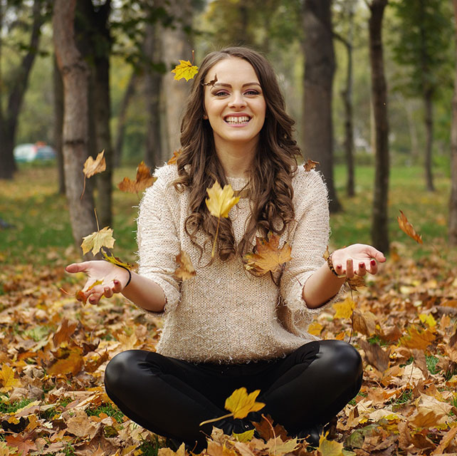 happy woman in a forest