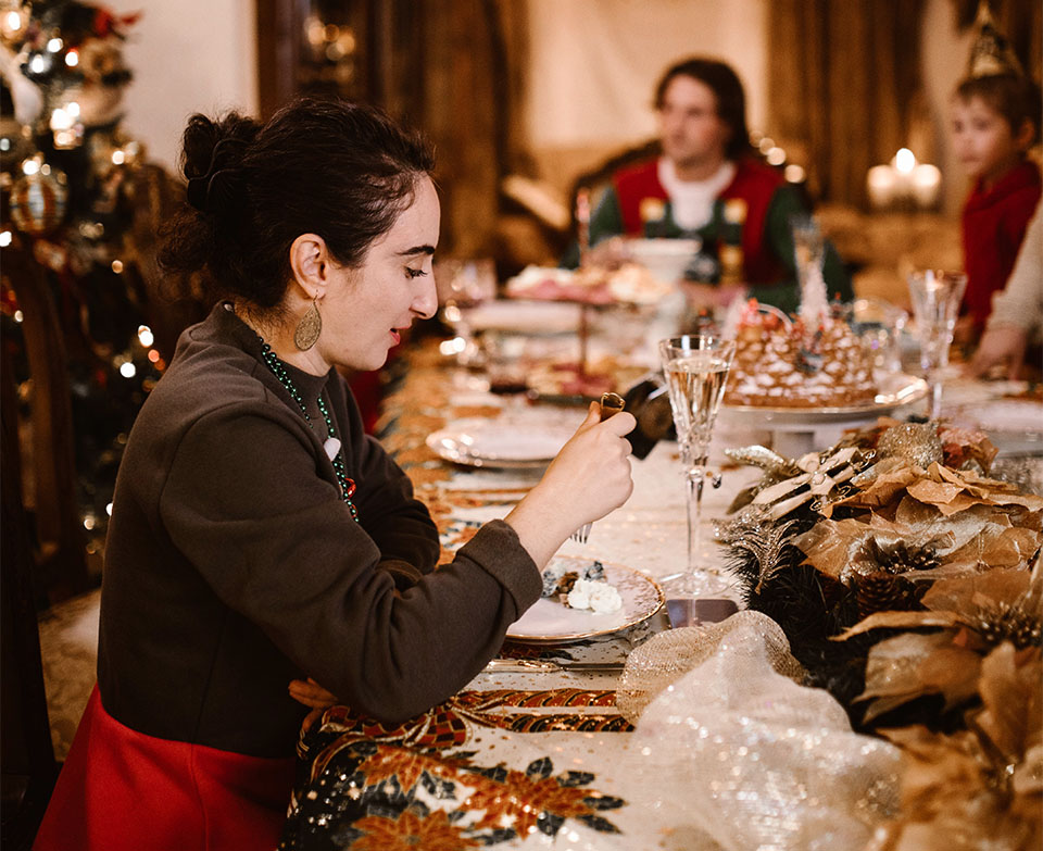 woman practicing mindful eating at Christmas