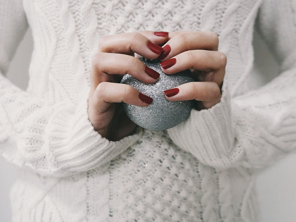 Woman holding an ornament practicing a mindfulness technique