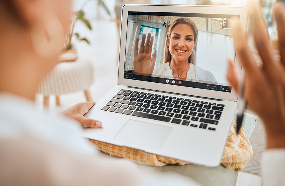 person on a video call with a health coach