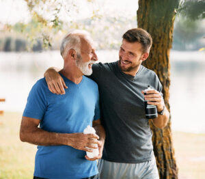 happy father and son walking
